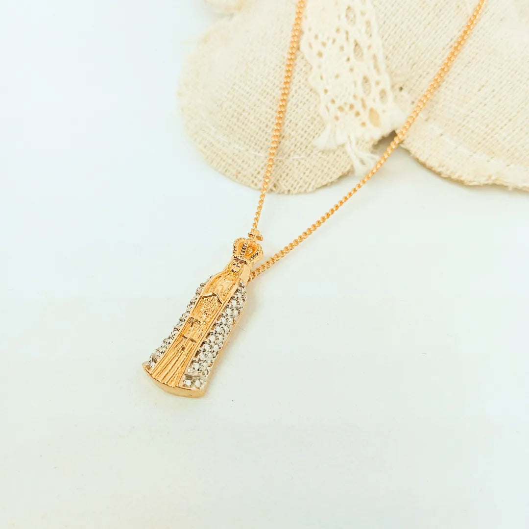 Gold Our Lady of Fátima pendant on a fine chain