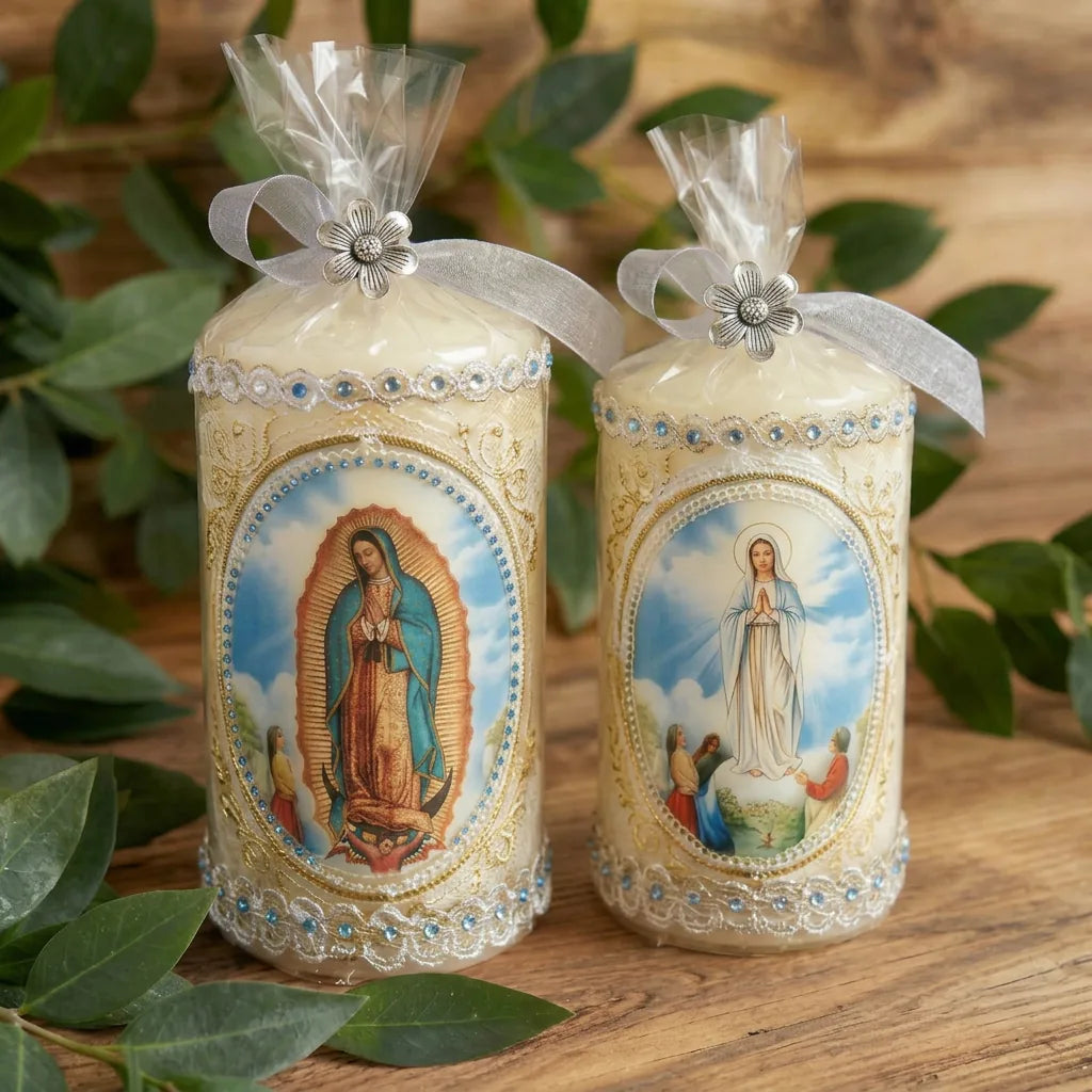 Two decorated devotional candles wrapped with ribbon