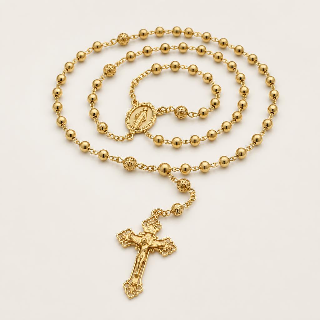 Gold-tone rosary with polished beads and a filigree crucifix